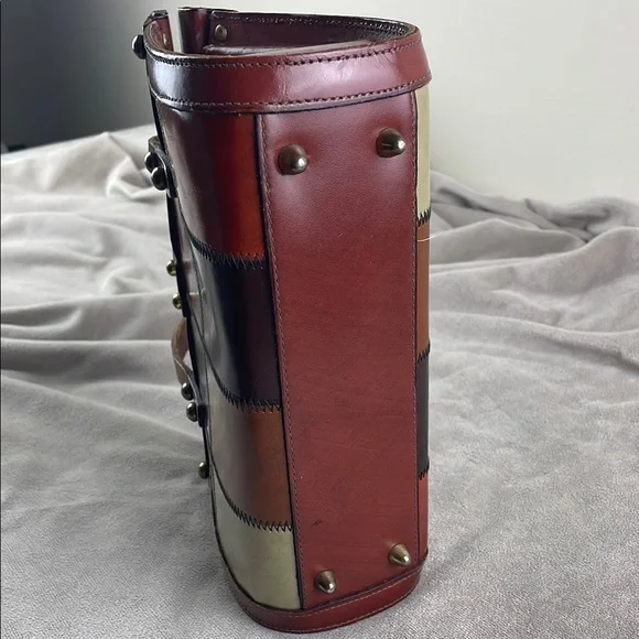 Vintage Brown Satchel with Structured Design and Metal Accents - Picture 10 of 15